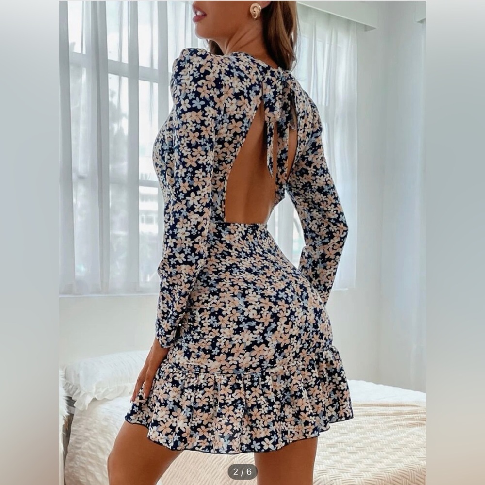 Floral dress, ruched, open back.